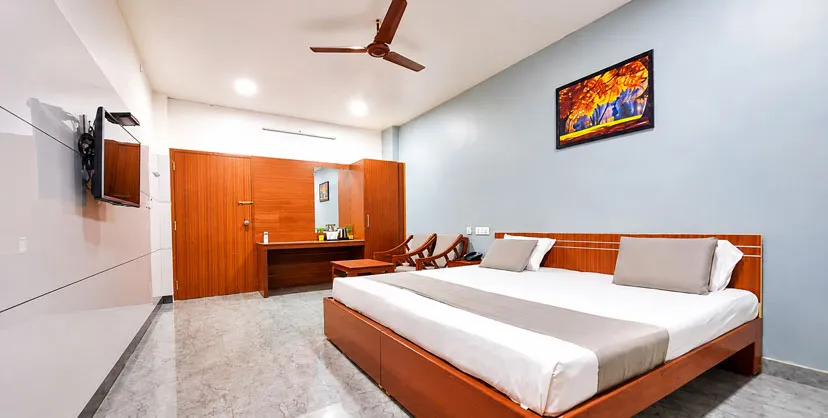 Spacious AC rooms and luxury suites at Sathya Garden Resort, best hotel in Mettupalayam Coimbatore for family stays